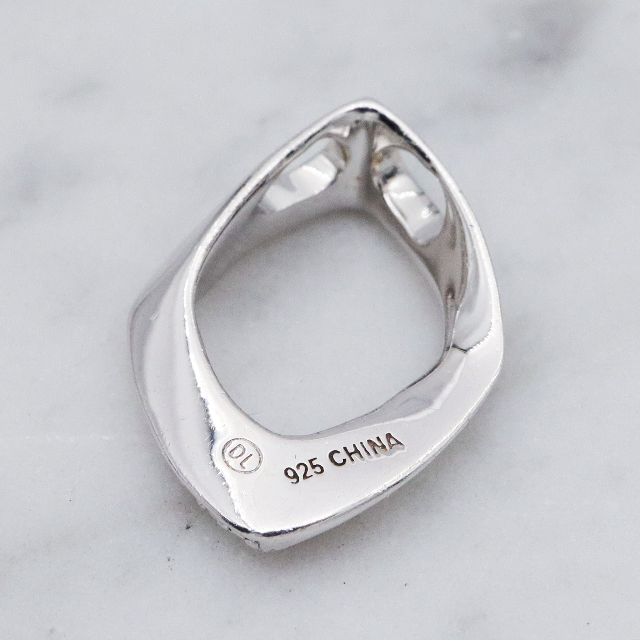 Vintage sterling silver and diamond abstract pendant